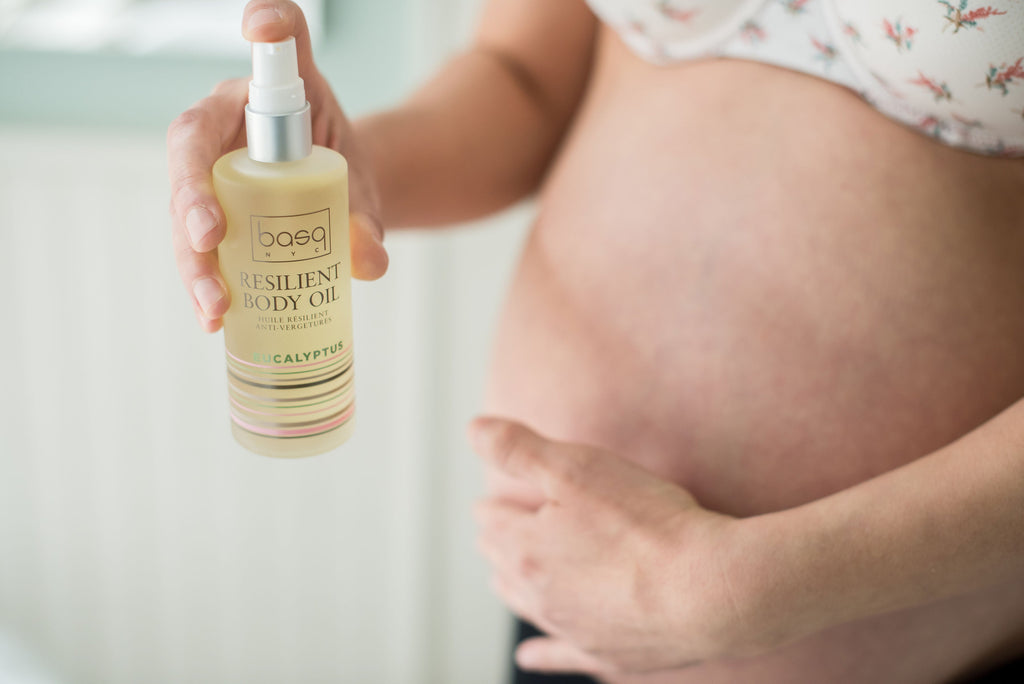 Pregnant model with eucalyptus oil